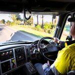 Truck driver on the road, illustrating long-haul truck driver costs