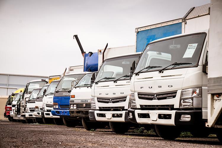 Row of used trucks illustrating truck resale value