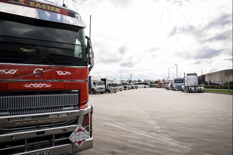 Truck stop conditions in Australia: trucks parked in a congested rest area, illustrating the parking shortages drivers report